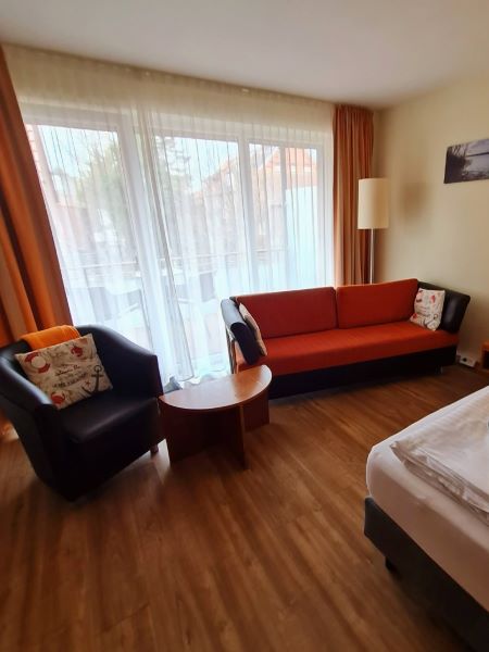 Couch und Sessel einraum appartement Hotel Atlantic Juist
