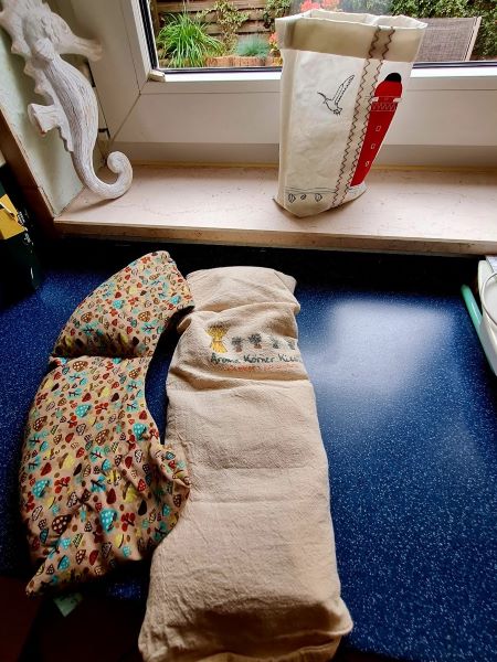 Wärmekissen gegen Nackenschmerzen im Oktober