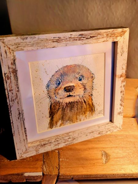 gezeichnetes Bild eines glitzernden Otters